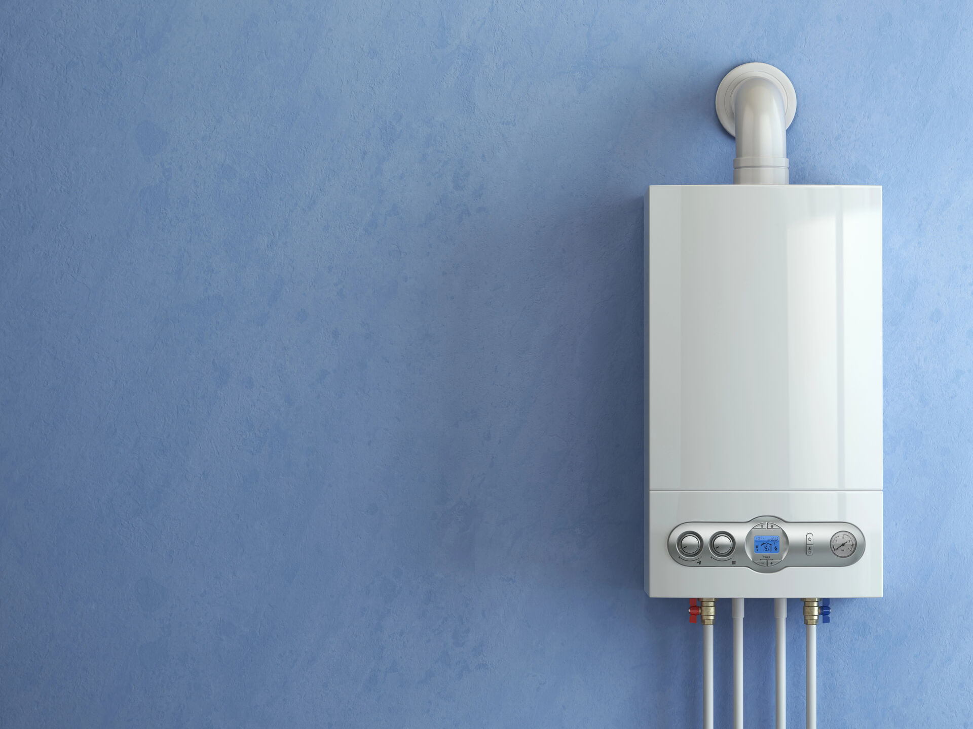 Caldaia a gas bianca moderna installata su una parete blu testurizzata, con pannello di controllo digitale e collegamenti idraulici visibili. Ideale per riscaldamento a Torino.